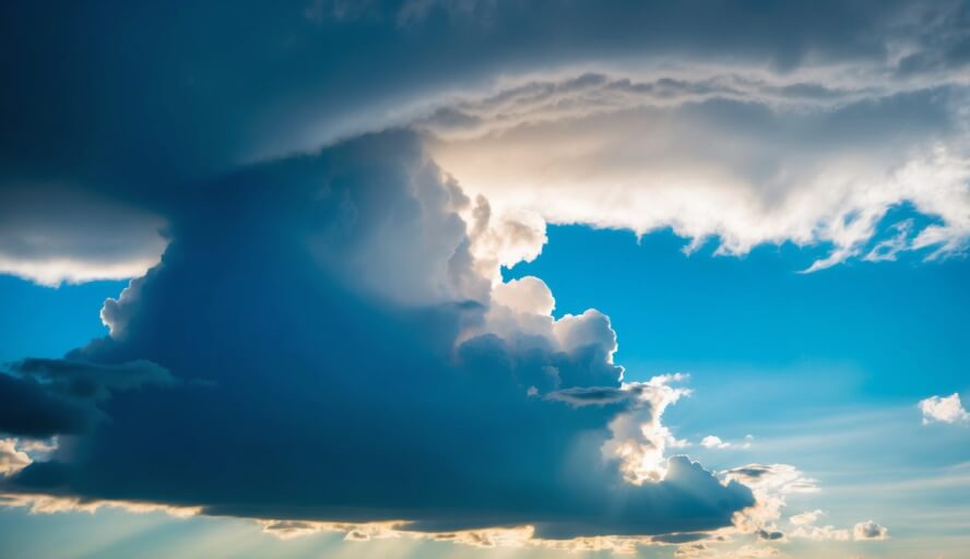 A dark storm cloud transforming into a clear blue sky, symbolizing the potential for change in a verbally abusive person