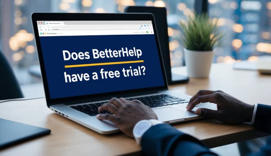 A person sitting at a desk, typing "Does BetterHelp Have a Free Trial?" into a search bar on a computer screen